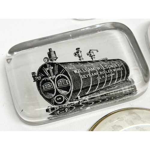 139 - 3 Early 20th Century Wilson Boiler advertising glass paperweights and 2 others.