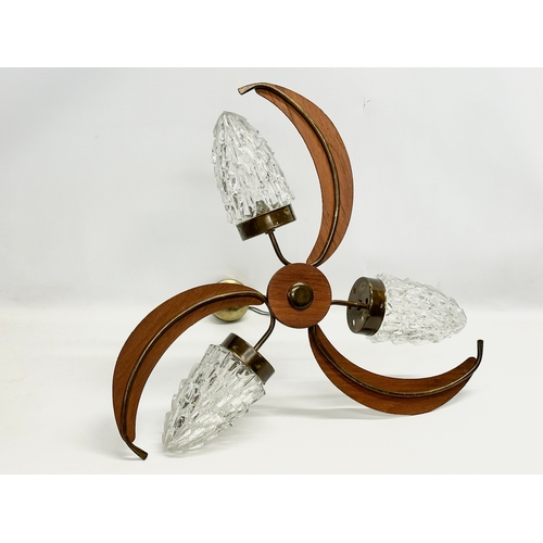 126 - A 1960’s Mid Century ceiling light with glass shades. 59x48cm