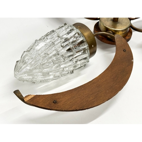 127 - A 1960’s Mid Century teak ceiling light with glass shades. 57x48cm.