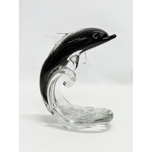 98 - A signed Swedish art glass dolphin by F.M. Ronneby. Sweden. 20x27cm