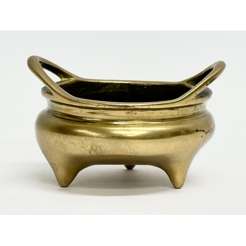 17 - An 18th/19th Century Chinese brass tripod censer with impressed interior dragon motif. Impressed Emp... 