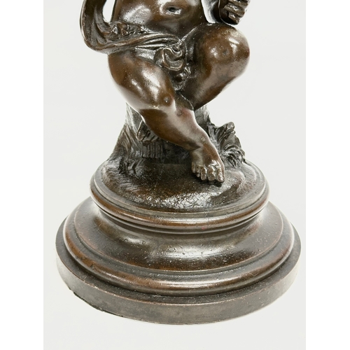 20 - A good quality 19th Century French bronze cherub censer figurine. 11x18cm.