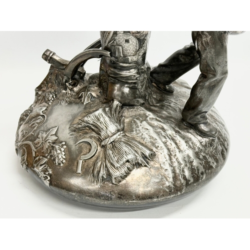 21 - Leon Fagel (1851-1912) a large French pewter centrepiece by Leon Fagel. Late 19th/Early 20th Century... 