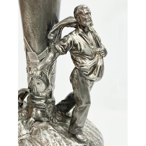 21 - Leon Fagel (1851-1912) a large French pewter centrepiece by Leon Fagel. Late 19th/Early 20th Century... 