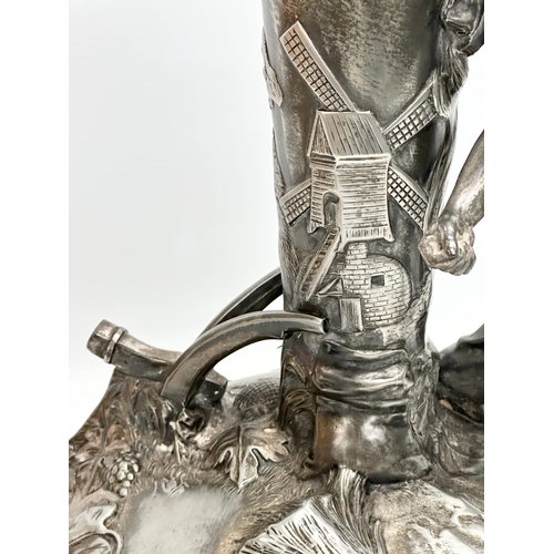 21 - Leon Fagel (1851-1912) a large French pewter centrepiece by Leon Fagel. Late 19th/Early 20th Century... 