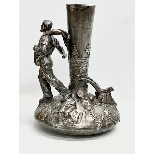 21 - Leon Fagel (1851-1912) a large French pewter centrepiece by Leon Fagel. Late 19th/Early 20th Century... 