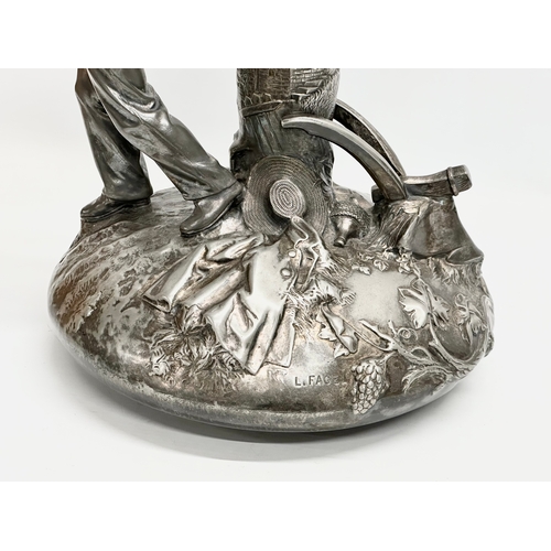 21 - Leon Fagel (1851-1912) a large French pewter centrepiece by Leon Fagel. Late 19th/Early 20th Century... 