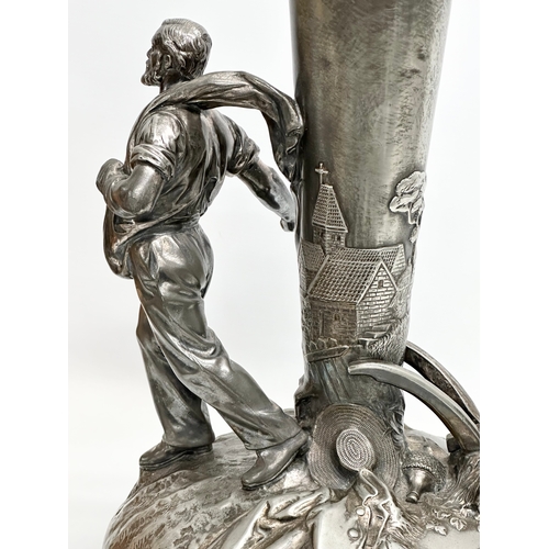 21 - Leon Fagel (1851-1912) a large French pewter centrepiece by Leon Fagel. Late 19th/Early 20th Century... 