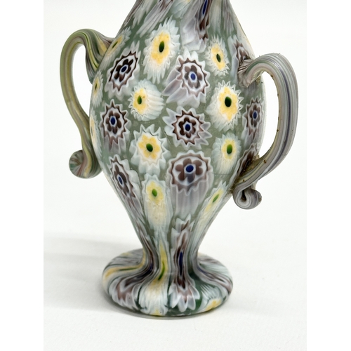 23 - Fratelli Toso. A rare Murano Millefiori glass vase by Fratelli Toso. 7x5x10cm.