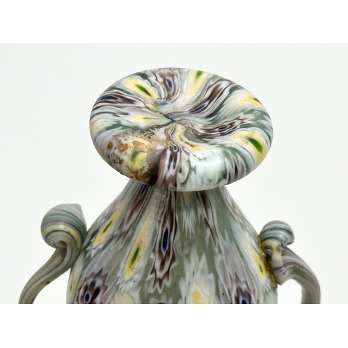 23 - Fratelli Toso. A rare Murano Millefiori glass vase by Fratelli Toso. 7x5x10cm.