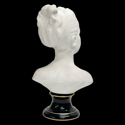 103 - Camille Tharaud. An Early 20th Century French Parian ware bust by Camille Tharaud, Limoges. On a cob... 