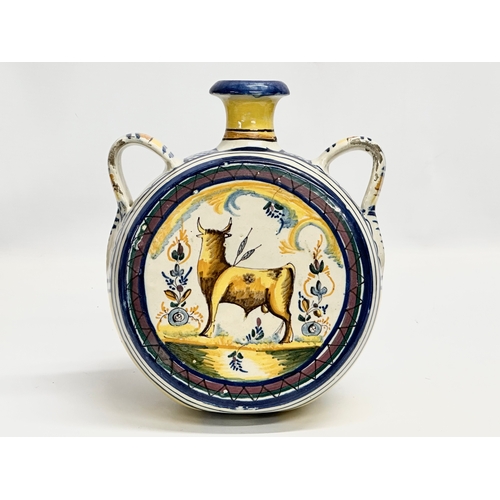 51 - An 18th Century Italian majolica enamelled canteen flask. 20x14.5x23cm.