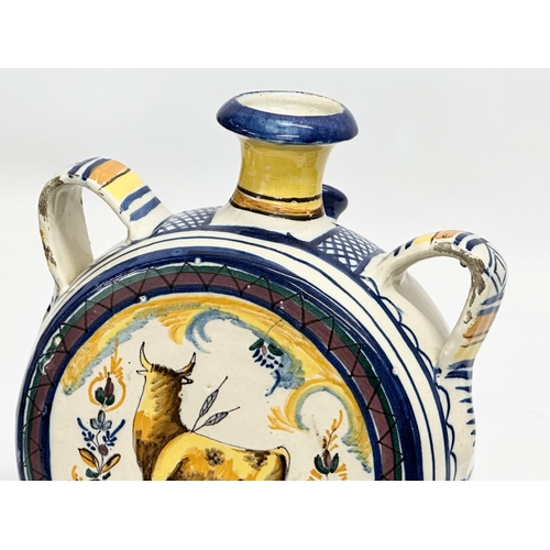 51 - An 18th Century Italian majolica enamelled canteen flask. 20x14.5x23cm.