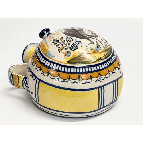 51 - An 18th Century Italian majolica enamelled canteen flask. 20x14.5x23cm.