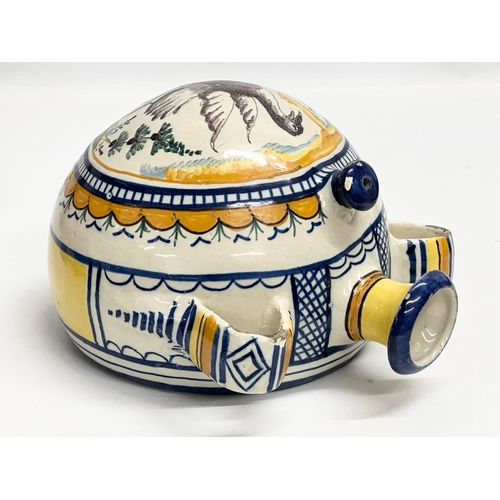 51 - An 18th Century Italian majolica enamelled canteen flask. 20x14.5x23cm.