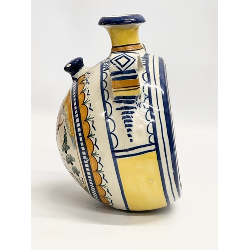 51 - An 18th Century Italian majolica enamelled canteen flask. 20x14.5x23cm.