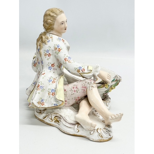 105 - John Bevington. A large Late 19th Century hand painted pottery figurine sweetmeat basket by John Bev... 