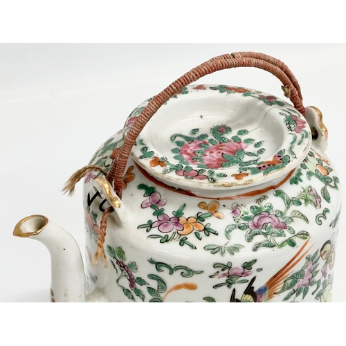 58 - A 19th Century Chinese Canton Famille Rose teapot with cover. 19x14x18cm