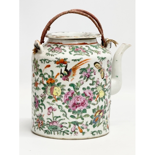 58 - A 19th Century Chinese Canton Famille Rose teapot with cover. 19x14x18cm