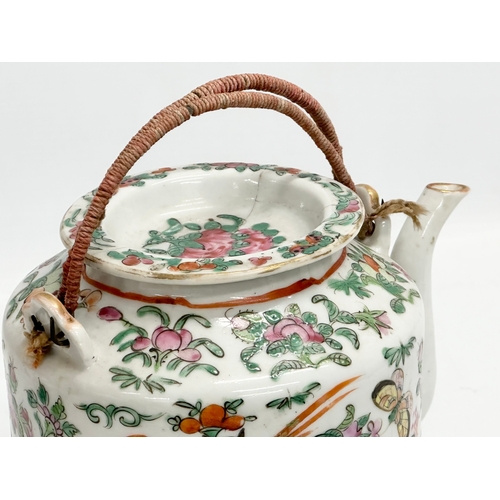 58 - A 19th Century Chinese Canton Famille Rose teapot with cover. 19x14x18cm