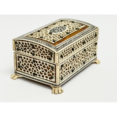 27 - A 19th Century Vizagapatam Anglo Indian bone and wood ring box. 9.5x6.5x5cm.