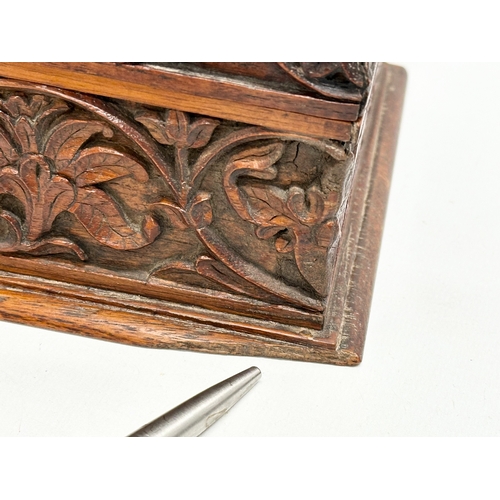 59 - A Late 19th Century Chinese carved teak casket box. 29x15x11.5cm.