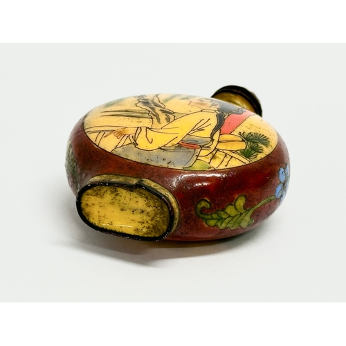 35 - A 19th Century Chinese enamelled snuff bottle. 4.5x6.5cm.