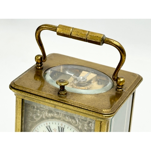 107 - A good quality Late 19th Century brass carriage clock. With key. 9x8x13cm