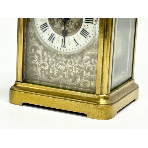 107 - A good quality Late 19th Century brass carriage clock. With key. 9x8x13cm