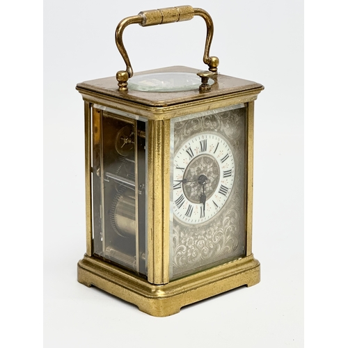 107 - A good quality Late 19th Century brass carriage clock. With key. 9x8x13cm