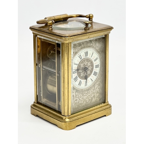 107 - A good quality Late 19th Century brass carriage clock. With key. 9x8x13cm