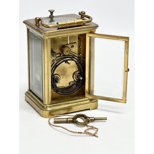 107 - A good quality Late 19th Century brass carriage clock. With key. 9x8x13cm