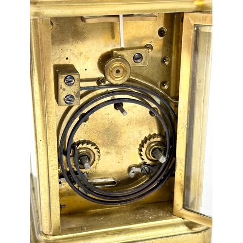 107 - A good quality Late 19th Century brass carriage clock. With key. 9x8x13cm