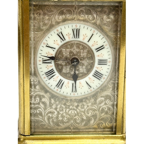 107 - A good quality Late 19th Century brass carriage clock. With key. 9x8x13cm