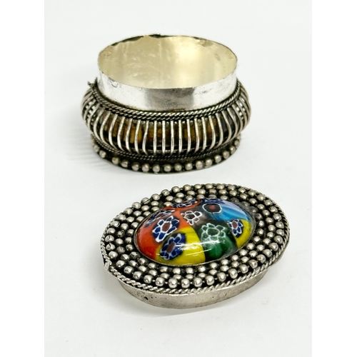 155 - 4 vintage trinket and pill boxes. Including a brass and hand painted porcelain portable ashtray. A m... 