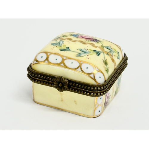 155 - 4 vintage trinket and pill boxes. Including a brass and hand painted porcelain portable ashtray. A m... 