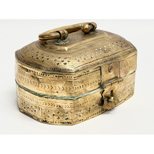 109 - A Late 19th Century Indian brass Paan box. 18x15x11cm