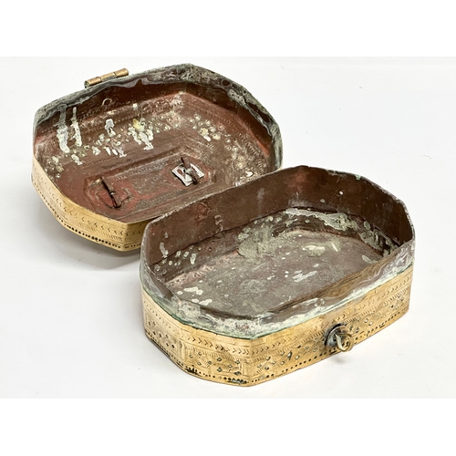 109 - A Late 19th Century Indian brass Paan box. 18x15x11cm