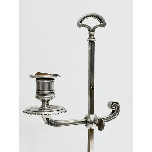 111 - A large Early 20th Century silver plated rise and fall candleholder. Circa 1900. 23x46.5cm