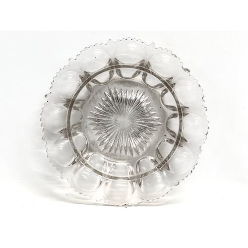 169 - A Victorian pressed glass bowl with scalloped rim. 19.5cm