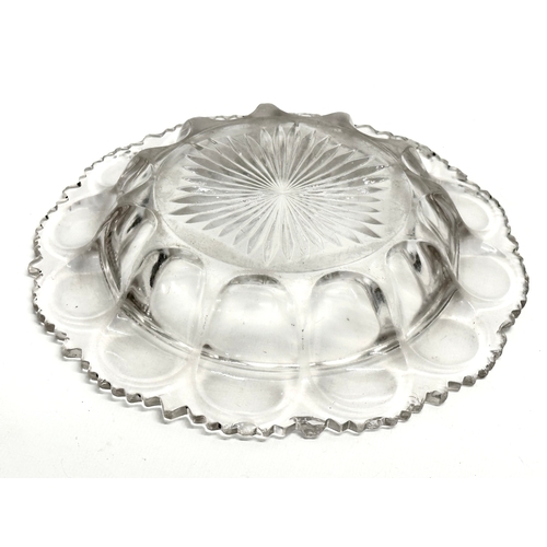 169 - A Victorian pressed glass bowl with scalloped rim. 19.5cm