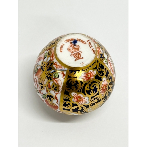 181 - A rare Royal Crown Derby miniature vase.