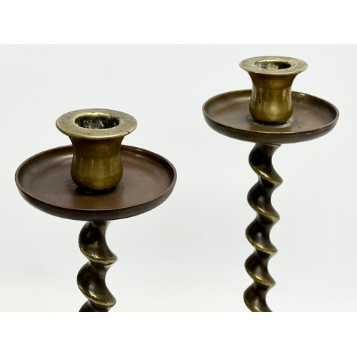 135 - A pair of large Victorian brass barley twist candlesticks. 14.5x37cm.