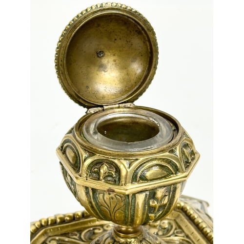 195 - A Victorian brass inkstand. 14x14x12cm.