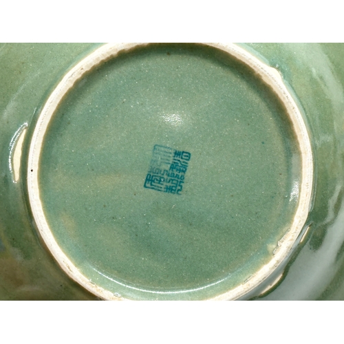 198 - A Chinese blue and white bowl with celadon glazed base. Seal mark. 19.5x4cm