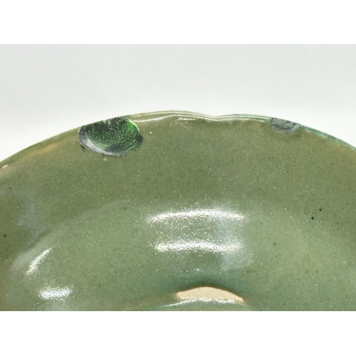 198 - A Chinese blue and white bowl with celadon glazed base. Seal mark. 19.5x4cm