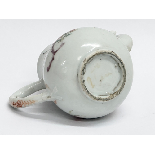 204 - A small 18th Century Chinese Export Famille Rose teapot. 12x12cm.