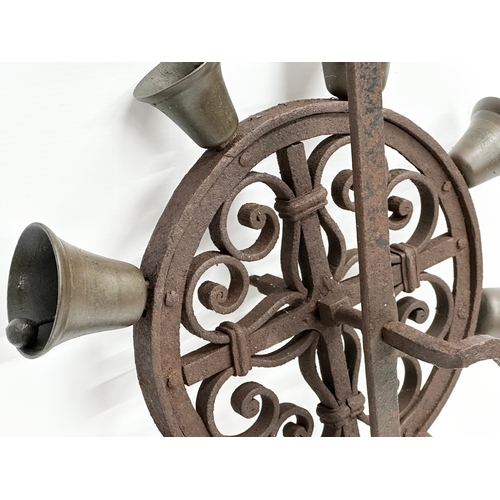 80 - A 19th Century rotating iron door bell. 69x23cm