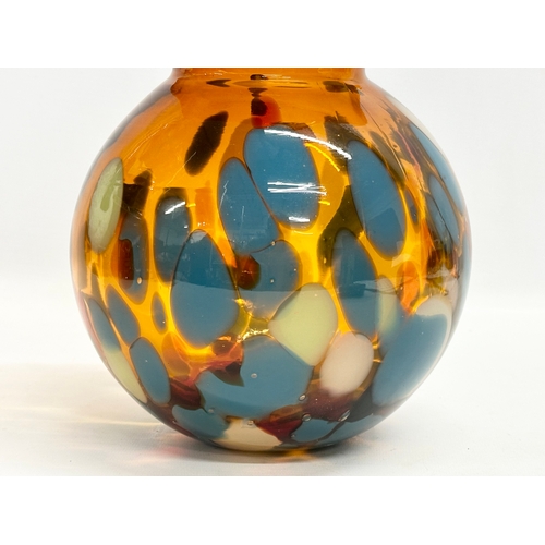 62A - A Mid 20th Century amber splatter glass vase with frilled rim. 19x22cm.