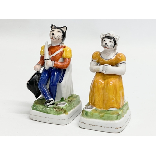 219 - A pair of rare Late 19th Century Victorian Staffordshire pen holders. 12.5cm.